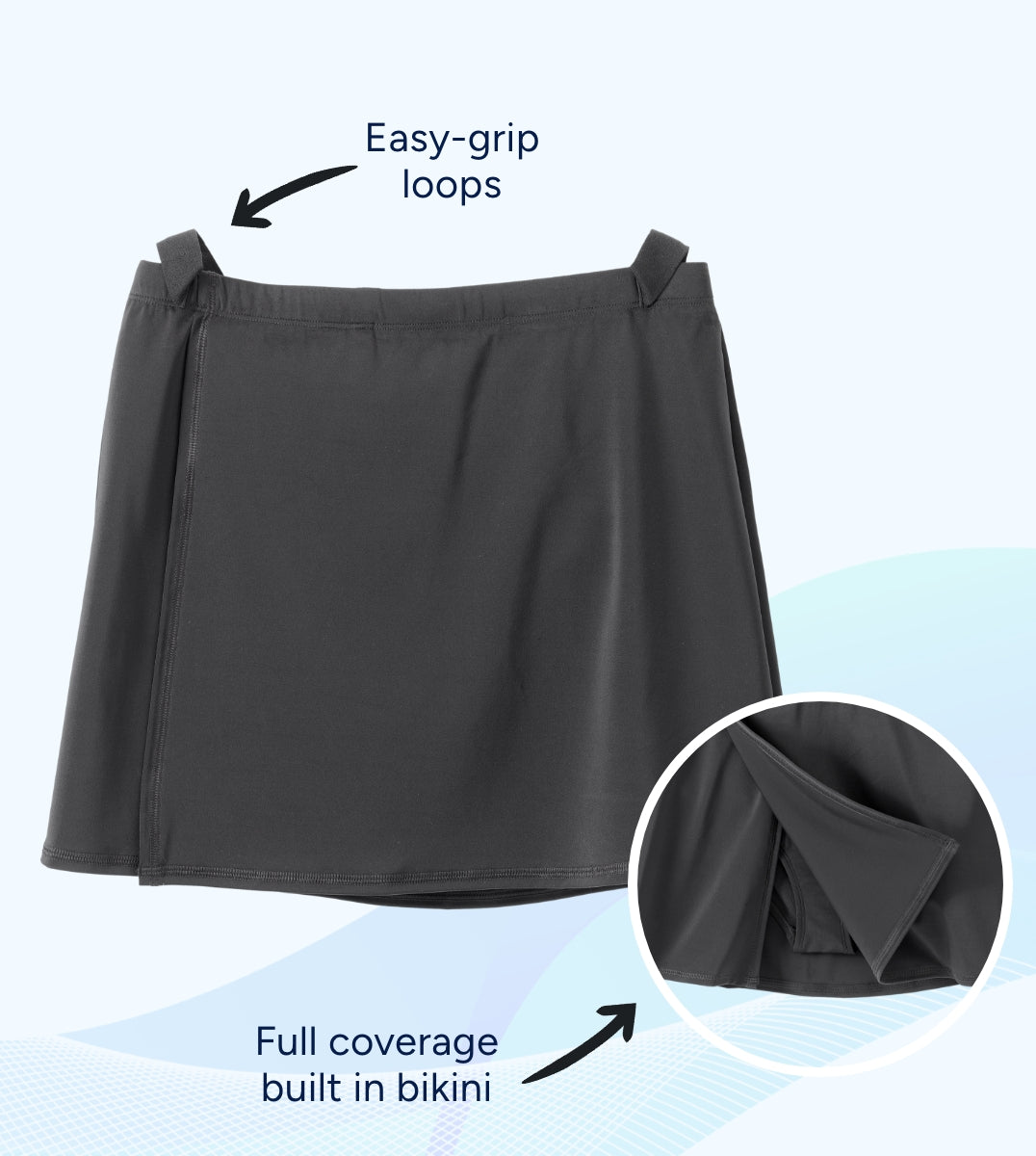 Black skirt with easy-grip loops and full coverage built-in bikini feature on a light blue background.