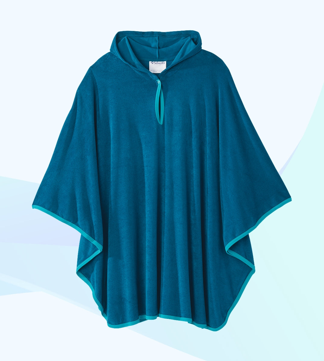 Teal hooded poncho on a light blue background